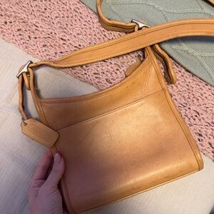 This is a vintage Coach Legacy Small Zip Bag (style 9997)